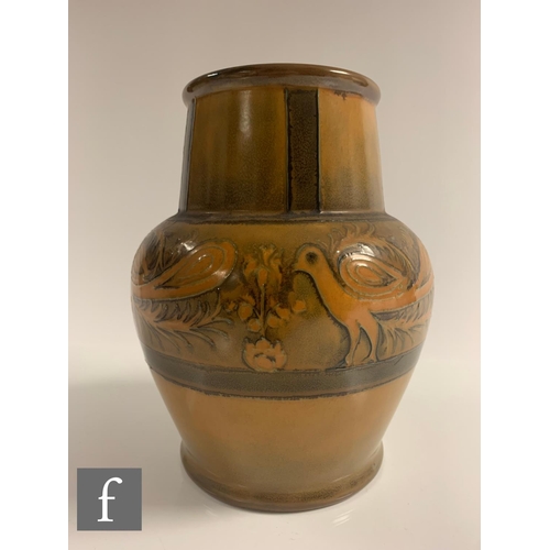 97 - William Moorcroft - A hand thrown pottery vase circa 1930, of shouldered ovoid form with a tapered c... 