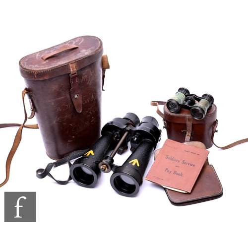 597 - A pair of Barr & Stroud CF41 binoculars, serial no 74441, military markings, in leather case, a ... 