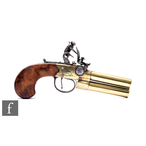 622 - An 18th Century over and under brass flintlock double barrel pistol by Twigg No 117706, 7cm barrels,... 