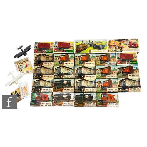 1 - A collection of assorted OO gauge railway accessories, to include various plastic buildings and plas... 