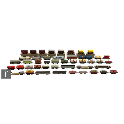 5 - A collection of forty six items of OO gauge rolling stock to include bolster wagons, tank wagons etc... 