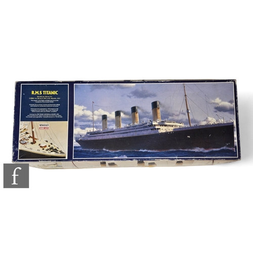 128 - A Minicraft 11315 RMS Titanic 1:350 scale plastic model kit, started but most pieces still on sprue,... 