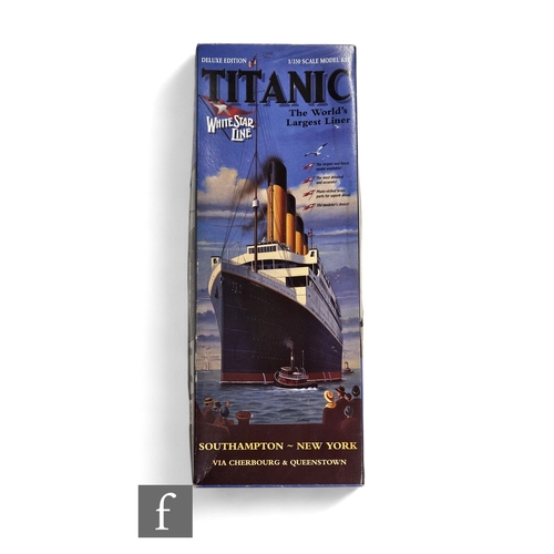 139 - A Minicraft 11315 Titanic 1:350 scale plastic model kit, started but most items still on sprue, boxe... 