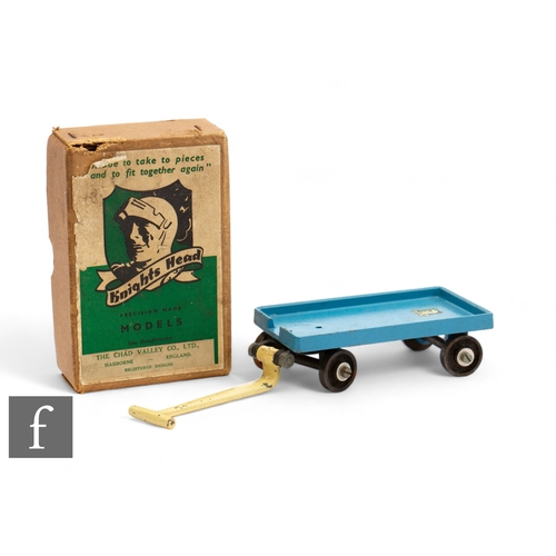 242 - A Chad Valley Knights Head platform truck, boxed with instructions.