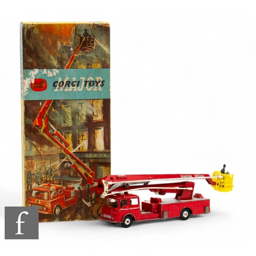 76 - A Corgi 1127 Bedford Simon Snorkel Fire Engine with red body, silver trim and platform, lemon interi... 