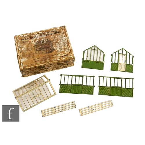 79 - A Britains Miniature Gardening Series Set No.053, comprising span roof greenhouse, two side panels, ... 