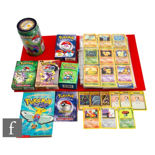 244 - A collection of assorted trading cards, to include Pokemon and Magic the Gathering, in a folder, tog... 