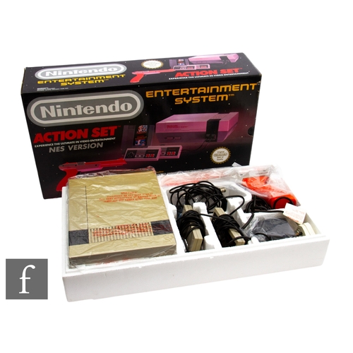 246 - A boxed Nintendo Entertainment System (NES) Action Set.