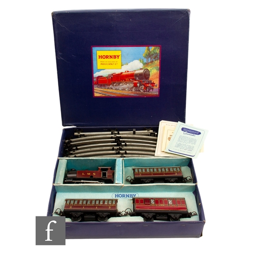 29 - An O gauge Hornby 101 Tank Passenger Set, comprising an 0-4-0T LMS maroon 2270 clockwork locomotive,... 