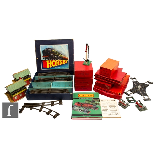 37 - A collection of O gauge Hornby items, boxed and unboxed track and scenic accessories, to include sig... 