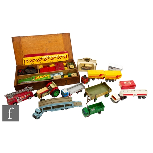 265 - A collection of assorted toys to include a Dinky Pullmore Car Transporter, a Czechoslovakian KDM tin... 