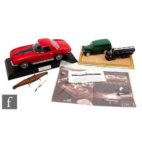 113 - Two Franklin Mint diecast models, to include a 1:24 scale 1946 Chevrolet Suburban with display case ... 