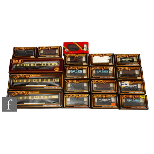 52 - A collection of OO gauge passenger coaches and rolling stock, mostly by Mainline, to include BR BSK ... 