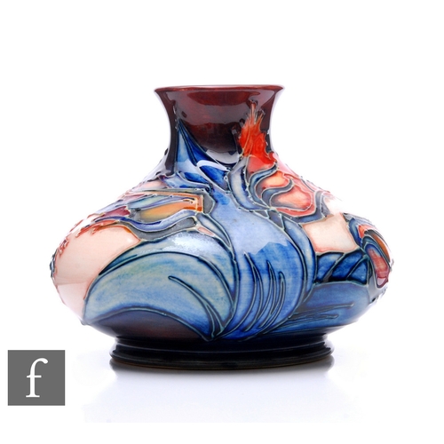 99 - Sally Tuffin - Moorcroft Pottery - A modern Moorcroft Pottery vase of low shouldered form with evert... 