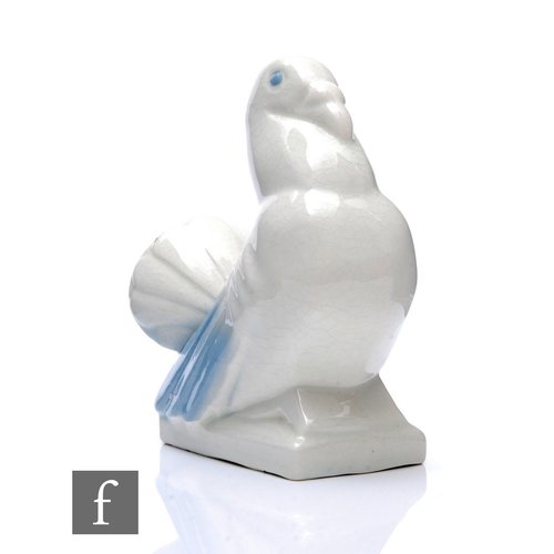 643 - Unattributed maker - An Art Deco dove, in the manner of Georges Ventrillon, white glazed and highlig... 