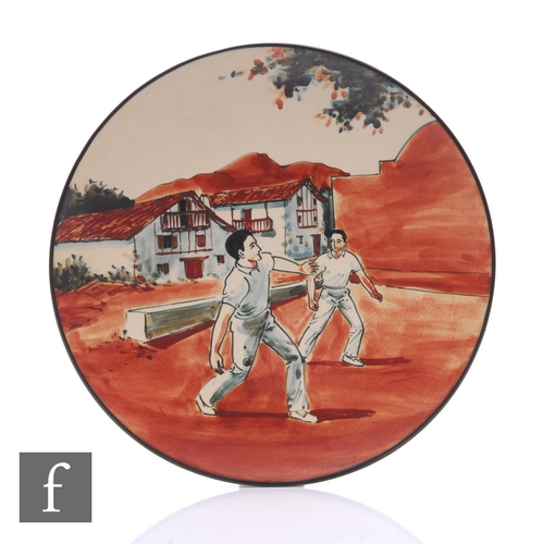 810 - C Fischer - RF Ciboure - A post war hand painted plate, decorated with scenes of cricketers in a vil... 