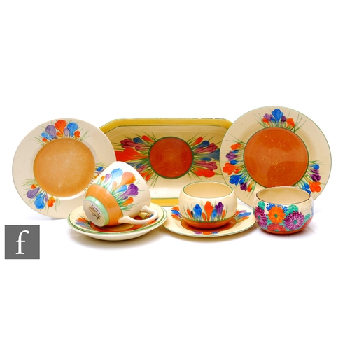 536 - Clarice Cliff - Crocus - A small assorted collection of items to include a cup, saucer and plate, a ... 