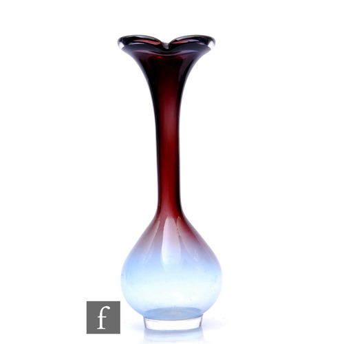 1079 - Nils Landberg - Orrefors - A mid Century 'Tan-Si' glass bulb vase, of compressed ovoid form on circu... 