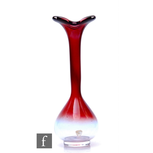 1081 - Nils Landberg - Orrefors - A mid Century 'Tan-Si' glass bulb vase, of compressed ovoid form on circu... 