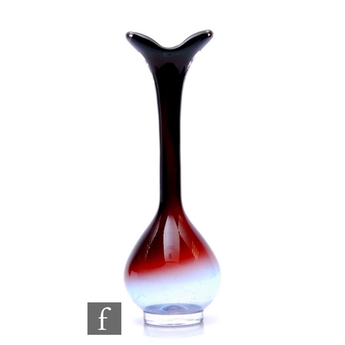 1082 - Nils Landberg - Orrefors - A mid Century 'Tan-Si' glass bulb vase, of compressed ovoid form on circu... 