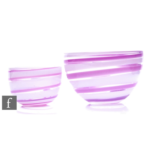 1085 - Ingeborg Lundin - Orrefors - A pair of 1960s graduated glass bowls, each of high sided circular sect... 