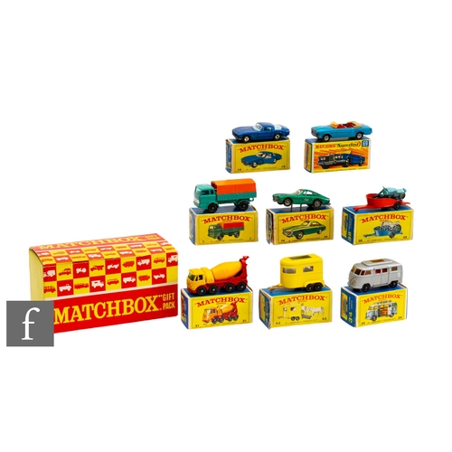 89 - A Matchbox Gift Pack box in yellow and red, containing a selection of Matchbox models comprising 34 ... 