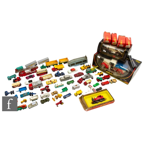 122 - A collection of assorted playworn diecast models by Corgi, Dinky, Matchbox and similar, together wit... 