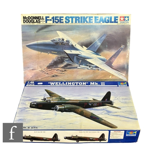 152 - A Tamiya 1:32 scale 60302 F-15 Strike Eagle plastic model kit, together with a Trumpeter 1:48 scale ... 