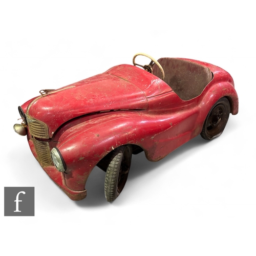 279 - An Austin J40 pedal car, finished in red.