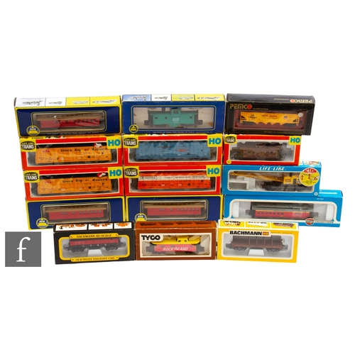 65 - A collection of HO gauge rolling stock by AHM, Life-life Trains, Bachmann and similar, to include bo... 