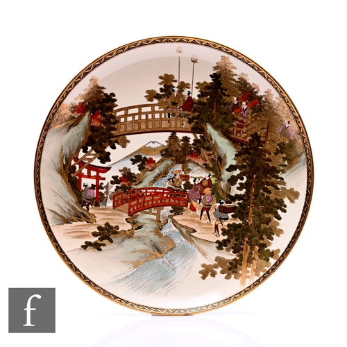 476 - A Japanese late Meiji Period (1868-1912) satsuma plate, signed Kichizan, of rounded circular form wi... 