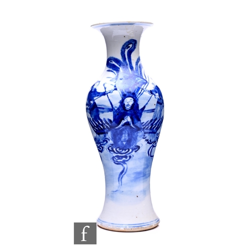 505 - A 19th Century Chinese Kangxi style blue and white baluster form vase, the white ground detailed in ... 