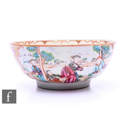 507 - An 18th Century Chinese export porcelain famille rose punch bowl, rising from a high footring, paint... 