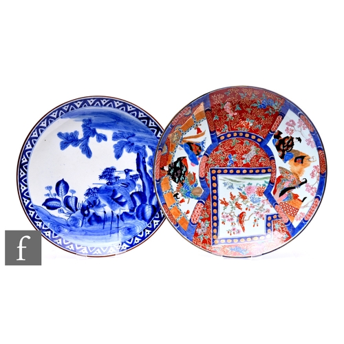 526 - Two Japanese late Meiji period (1868-1912) chargers, to include an Imari and fukagawa style example,... 