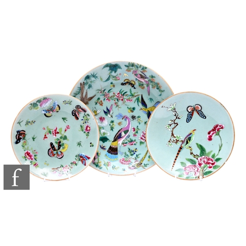 531 - A collection of 19th Century Chinese celadon ground famille rose dishes, all similarly decorated wit... 