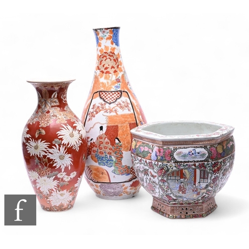 519 - Three Chinese and Japanese ceramics, to include a hexagonal famille rose jardiniere, height 30cm, a ... 