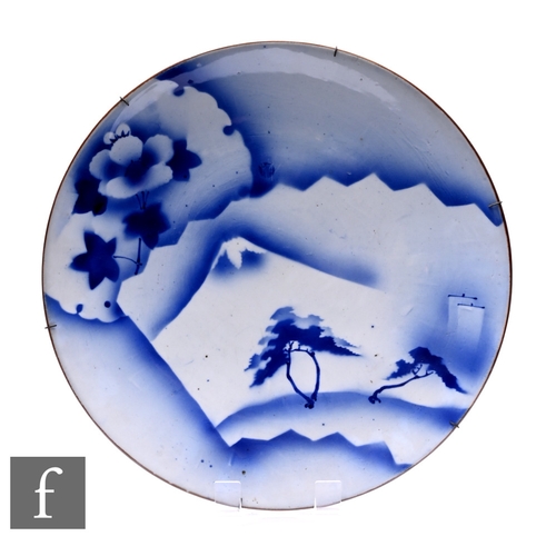 534 - A Japanese fukagawa porcelain charger, with stylised landscape decoration, diameter 46cm, unmarked.