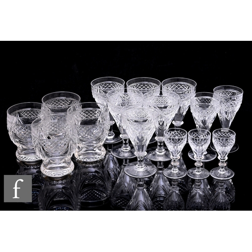 23 - A part suite of 20th century cut glassware, comprising of four tumblers, set of six matching wines, ... 