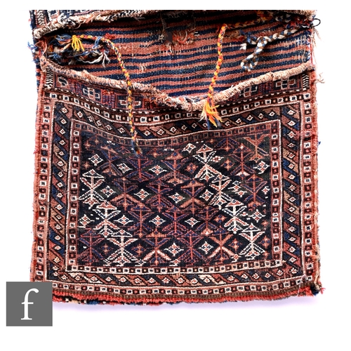 557 - A 19th Century Tekke/Shahsavan kilim Khorjin (tribesman's bag), with unusual strips of pile weave ba... 