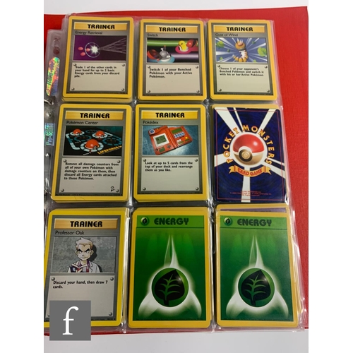 244 - A collection of assorted trading cards, to include Pokemon and Magic the Gathering, in a folder, tog... 