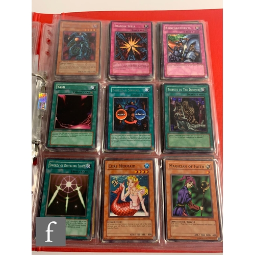 244 - A collection of assorted trading cards, to include Pokemon and Magic the Gathering, in a folder, tog... 