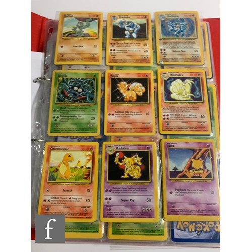 244 - A collection of assorted trading cards, to include Pokemon and Magic the Gathering, in a folder, tog... 