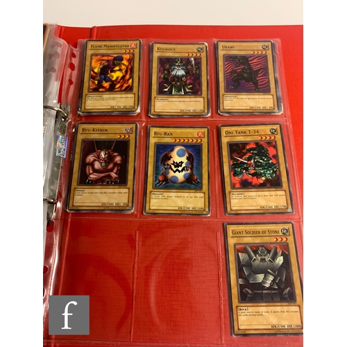 244 - A collection of assorted trading cards, to include Pokemon and Magic the Gathering, in a folder, tog... 