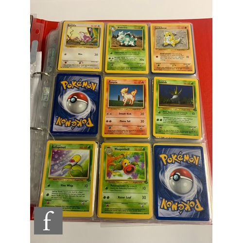 244 - A collection of assorted trading cards, to include Pokemon and Magic the Gathering, in a folder, tog... 