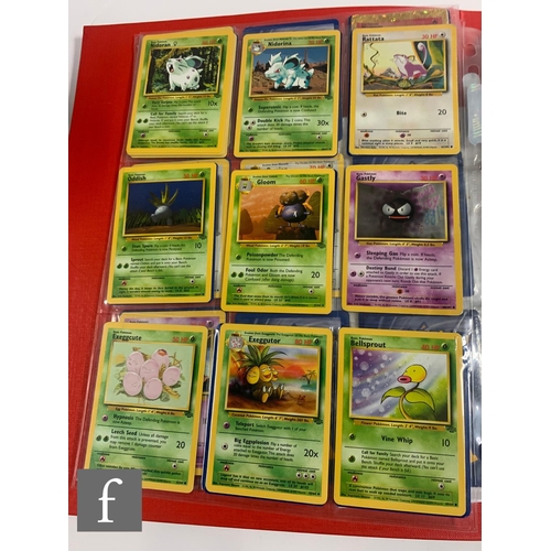 244 - A collection of assorted trading cards, to include Pokemon and Magic the Gathering, in a folder, tog... 