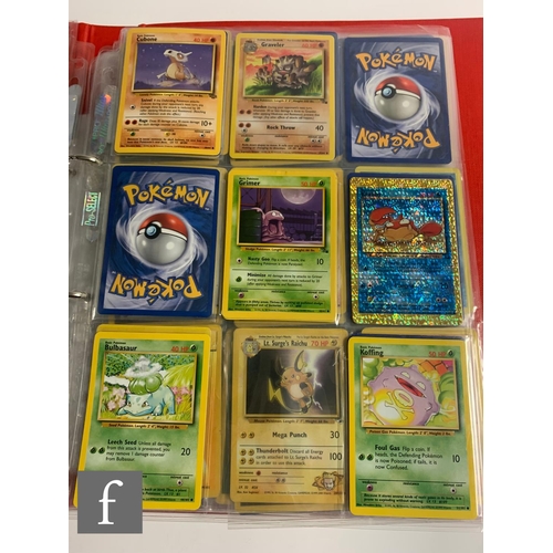 244 - A collection of assorted trading cards, to include Pokemon and Magic the Gathering, in a folder, tog... 