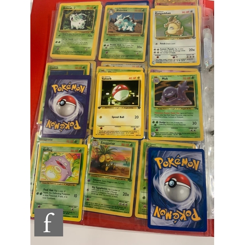 244 - A collection of assorted trading cards, to include Pokemon and Magic the Gathering, in a folder, tog... 