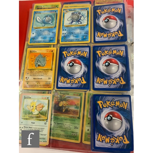 244 - A collection of assorted trading cards, to include Pokemon and Magic the Gathering, in a folder, tog... 