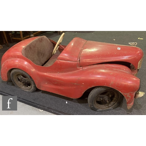 279 - An Austin J40 pedal car, finished in red.