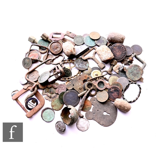 79 - A collection of 17th to 20th Century metal detecting finds to include lead loom weights, buckles, sn... 